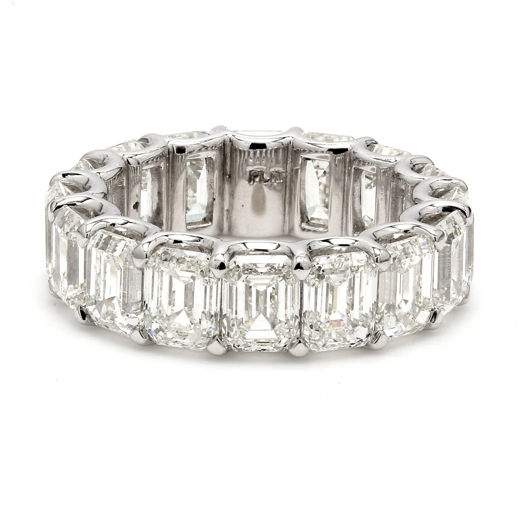 Eternity band in platinum with U-prong set H-I/VS emerald cut diamonds.  D11.38ct.t.w.  Size 6.5