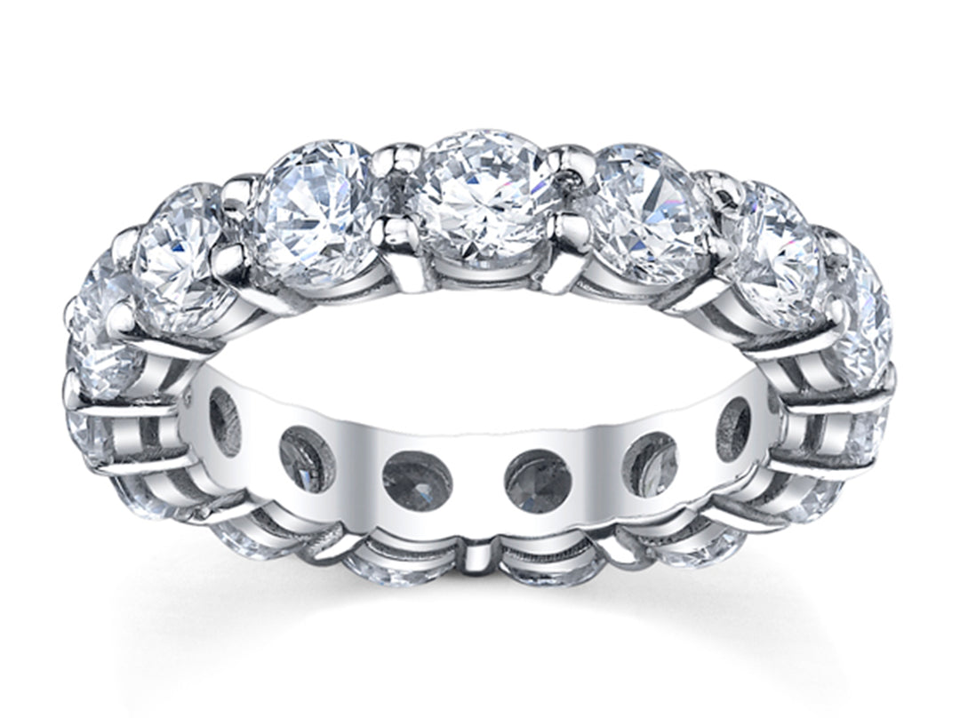Eternity band with shared 4-prong set (14) round diamonds.  D4.54ct.t.w.  Size 5.25