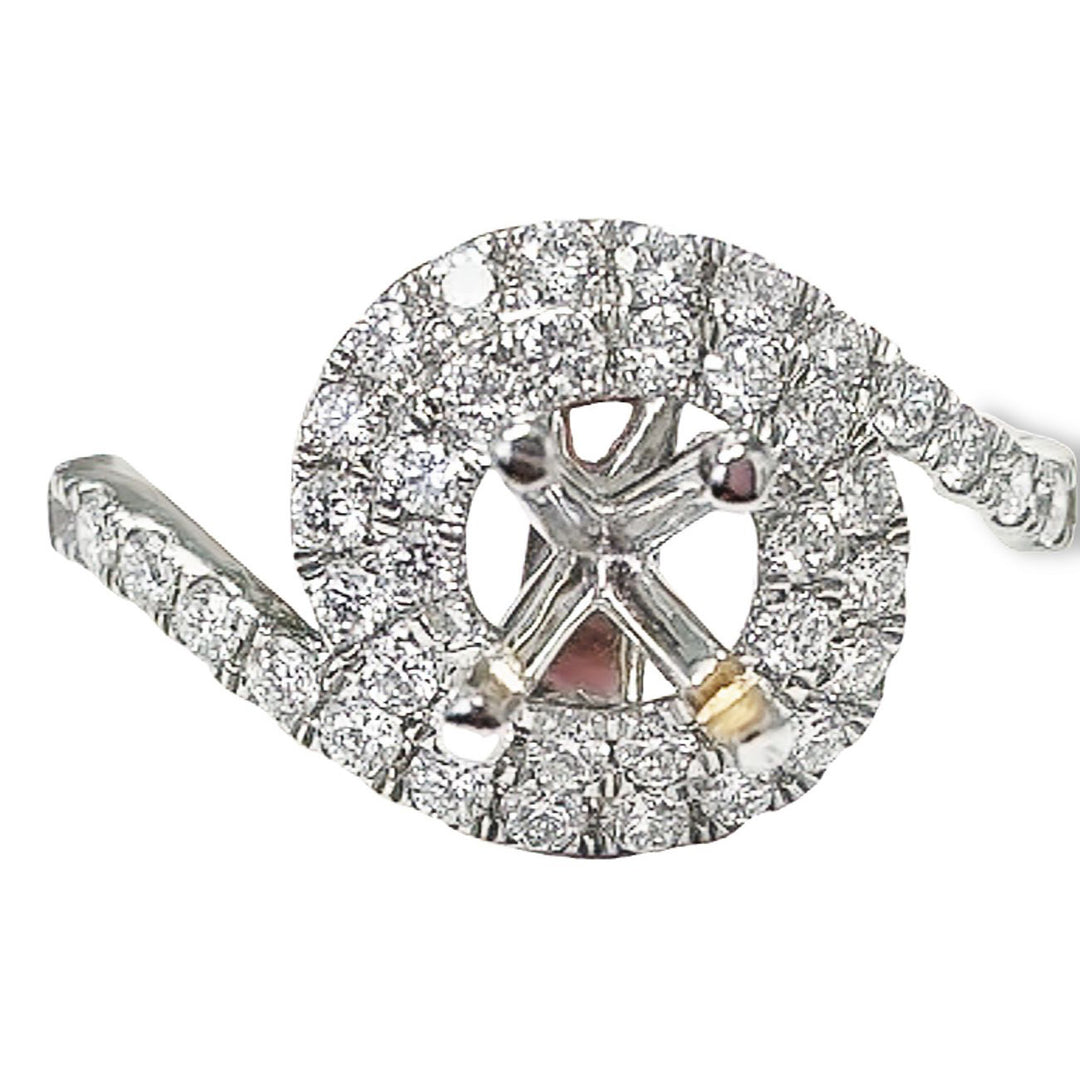 Semi-mount in 18K WG with shared prong set round diamonds.  D1.30ct.t.w.