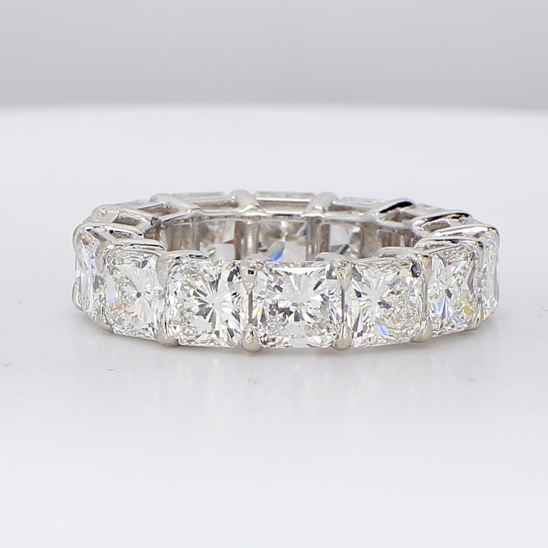 Eternity band in platinum with shared prong set VS+ (14) radiant cut diamonds.  D10.25ct.t.w.  Size 5.75