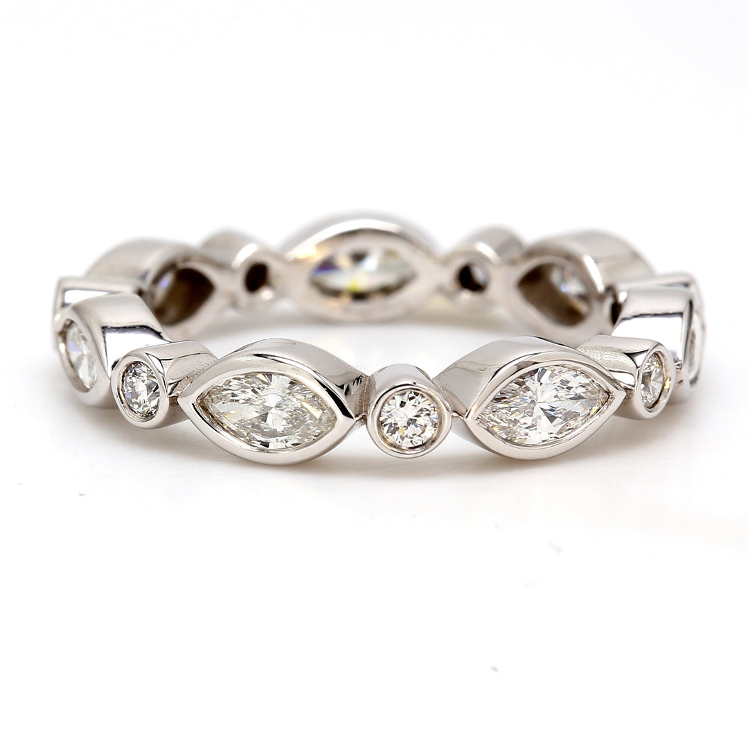 Eternity band with alternating bezel set marquise and round diamonds.  D1.32ct.t.w.  Size 8.5