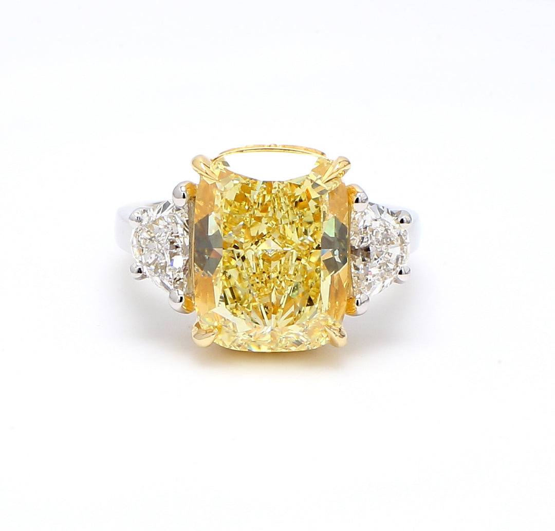 3-stone semi-mount in platinum & 18K YG with prong set half moon diamond sides.  D1.31ct.t.w.