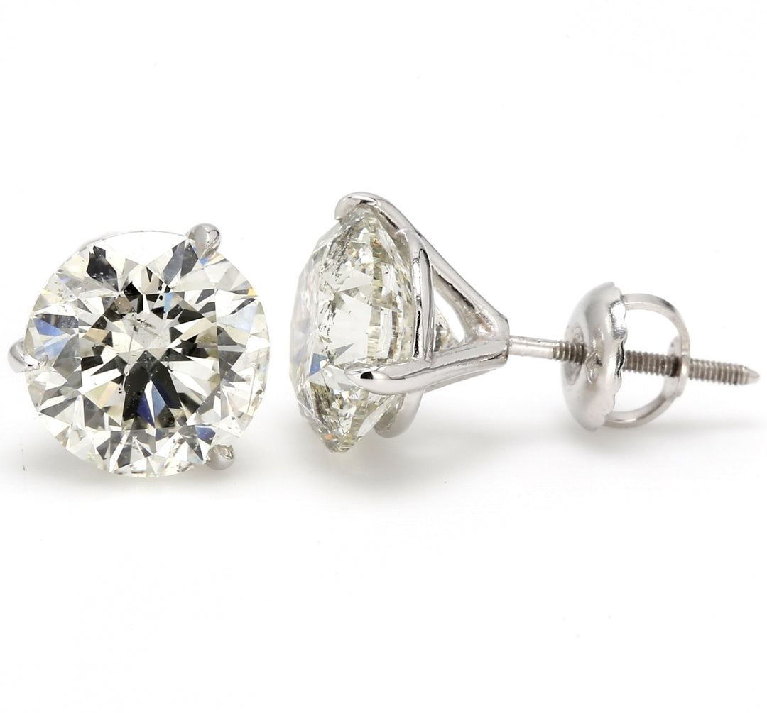 Stud earrings martini style with 3-prong set USA certified I-J/SI2 round diamonds.  D5.43ct.t.w.