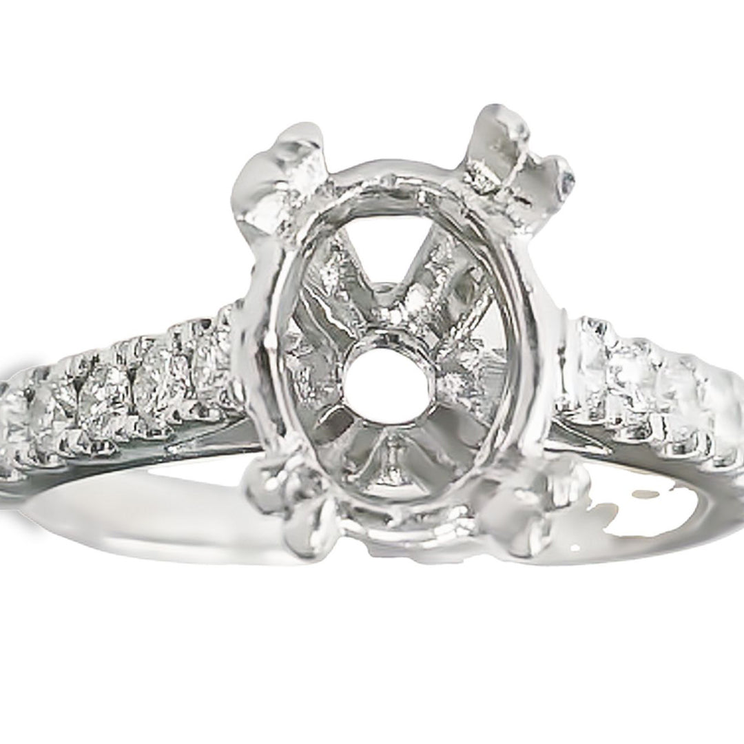 Semi-mount for oval center in 18K WG with U-prong set round diamonds.  D0.50ct.t.w.