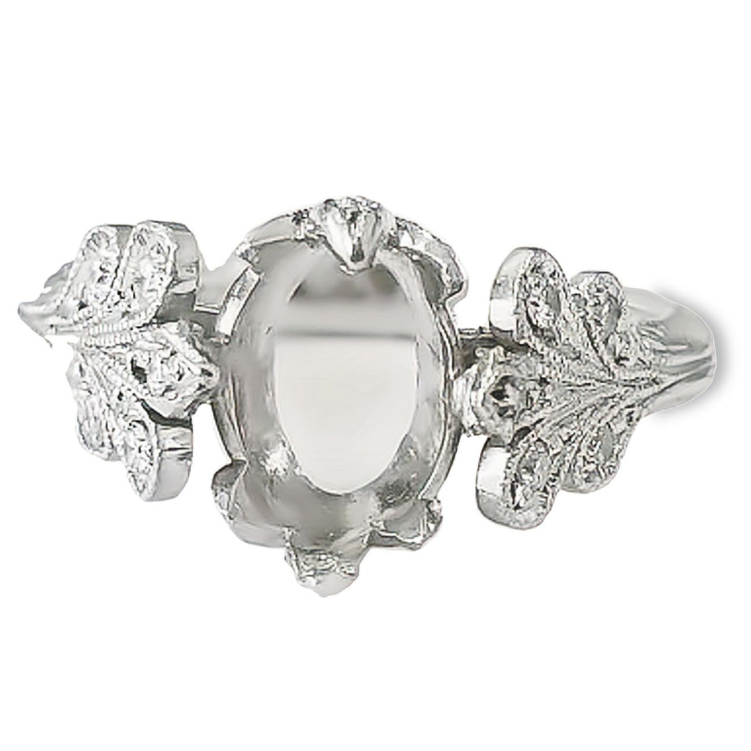 Antique style semi-mount in platinum with hand engraving and pre-set round diamonds.  D0.20ct.t.w.