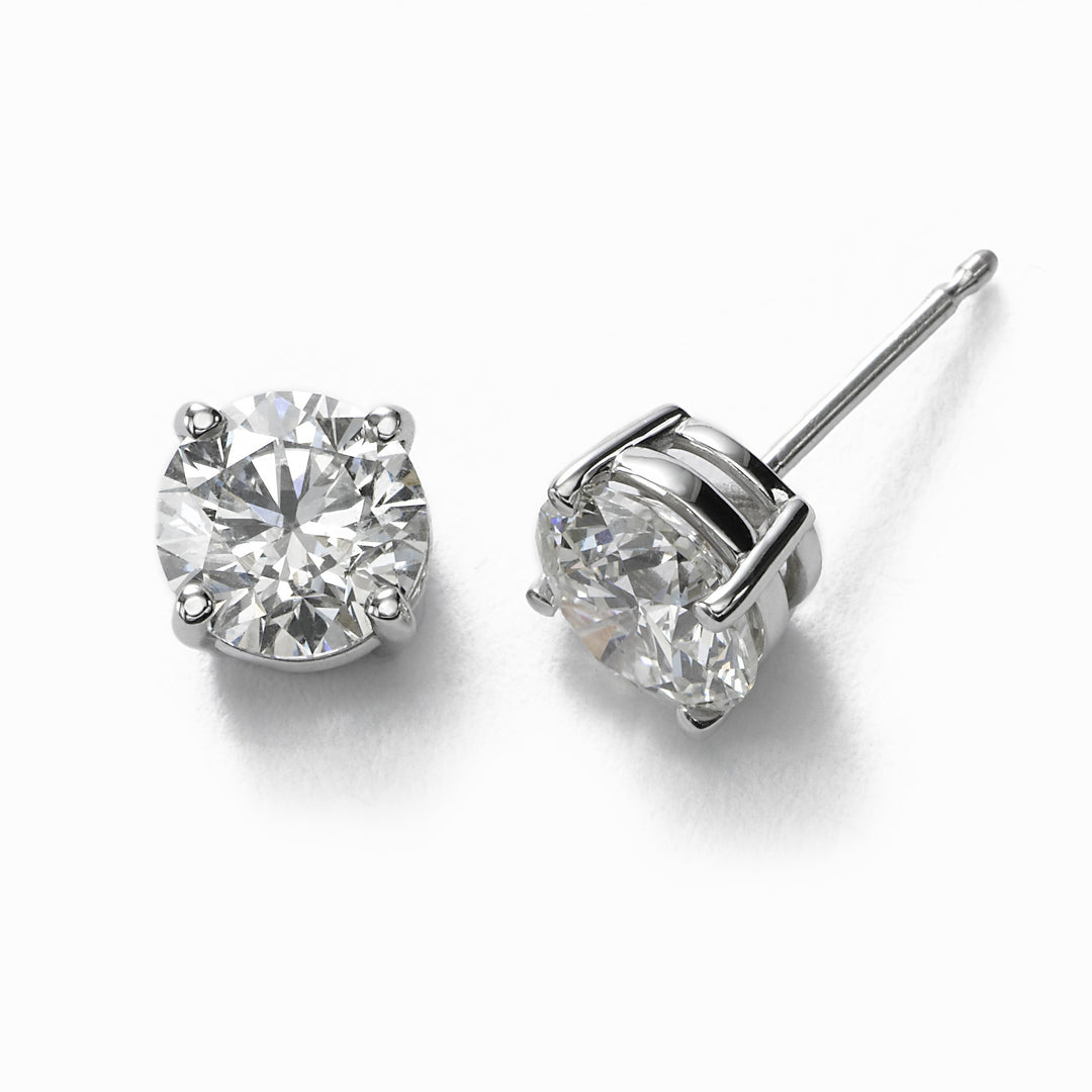 Push back stud earrings with 4-prong set USA certified E-F/SI2-SI3 round diamonds.  D1.48ct.t.w.