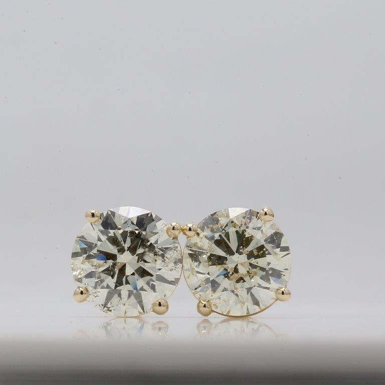 Screw back stud earrings in 14K YG with 4-prong set USA certified J-K/SI2 round diamonds. D3.42ct.t.w.