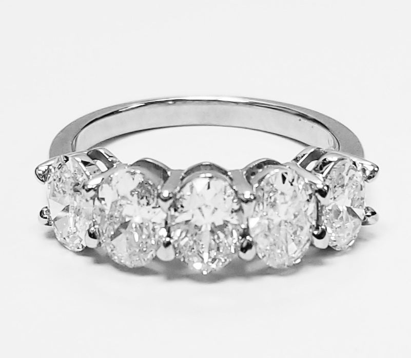 5-stone band with shared prong set oval cut diamonds.  D2.56ct.t.w.  Size 7