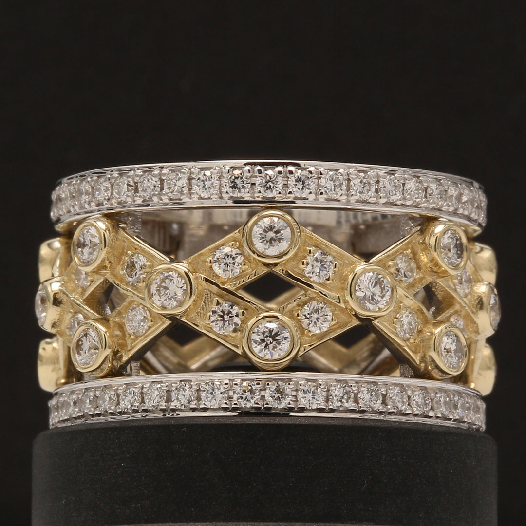 Band in two-tone with prong and bezel set round diamonds.  D2.36ct.t.w.