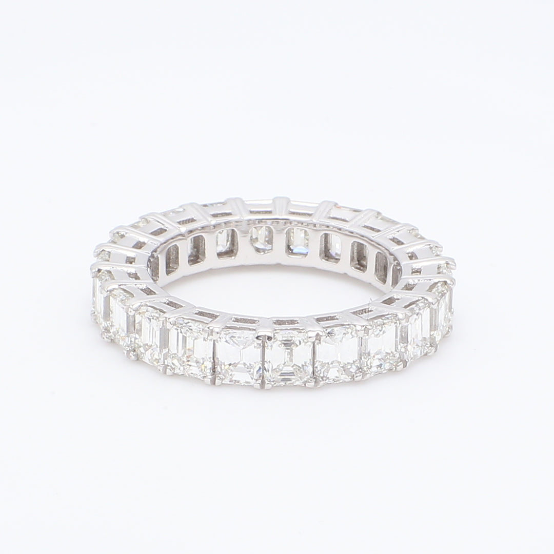 Eternity band in platinum with double basket prong set emerald cut diamonds.  D4.51ct.t.w.