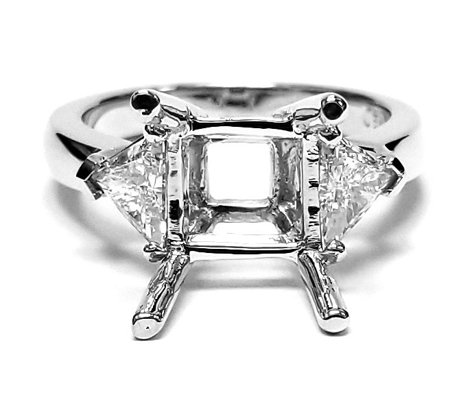 3-stone semi-mount in 18K WG with 3-prong set trilliant cut diamond sides.  D1.09ct.t.w.