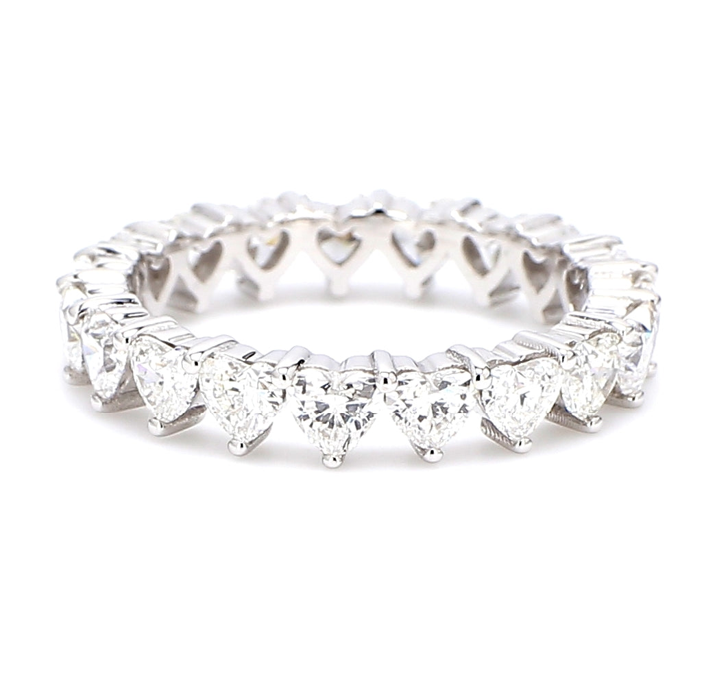 Eternity band in platinum with 3-prong set (19) heart shape diamonds.  D2.25ct.t.w.  Size 6