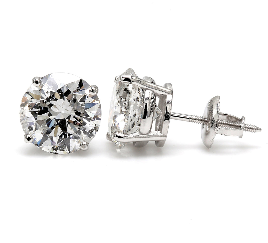 Screw back stud earrings with 4-prong set USA certified D/SI3 round diamonds.  D4.10ct.t.w.