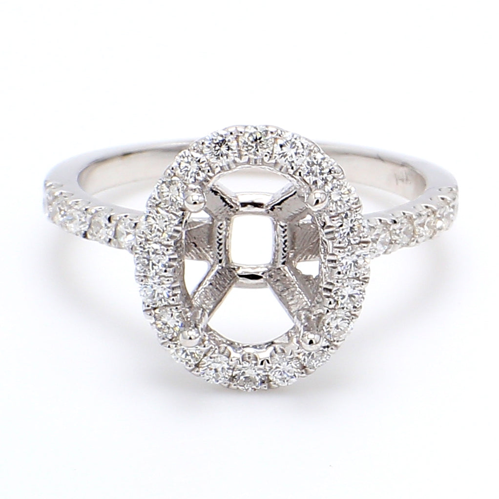 Halo semi-mount with U-prong set round diamonds.  D0.53ct.t.w.  Size 6