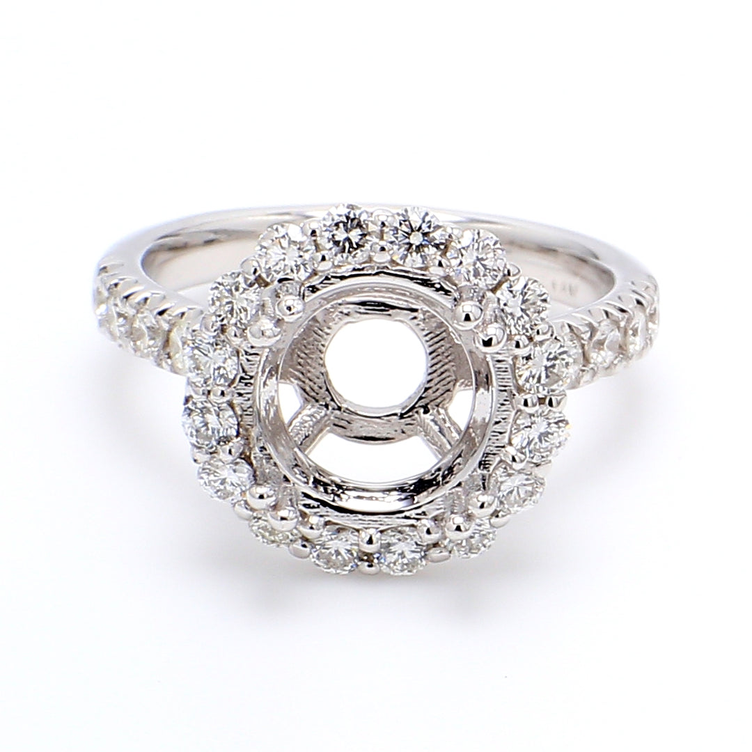 Halo semi-mount with U-prong set round diamonds.  D0.82ct.t.w.  Size 5.75