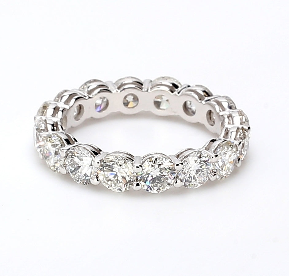 Eternity band with shared 4-prong set round diamonds.  D4.69ct.t.w.  Size 7