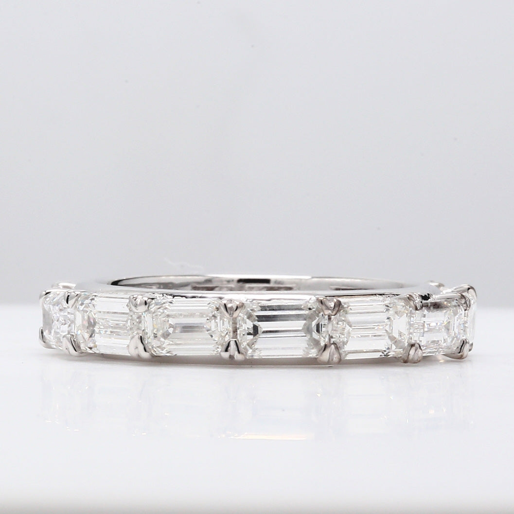 Eternity band with prong set emerald cut diamonds.  D4.47ct.t.w.  Size 7