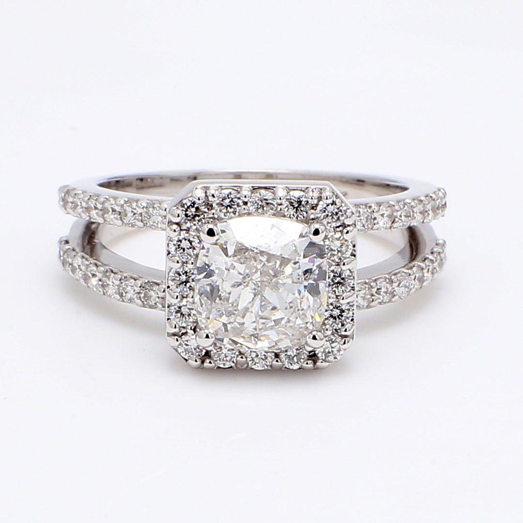 Halo split-shank semi-mount with pre-set round diamonds.  D0.89ct.t.w.  Size 6
