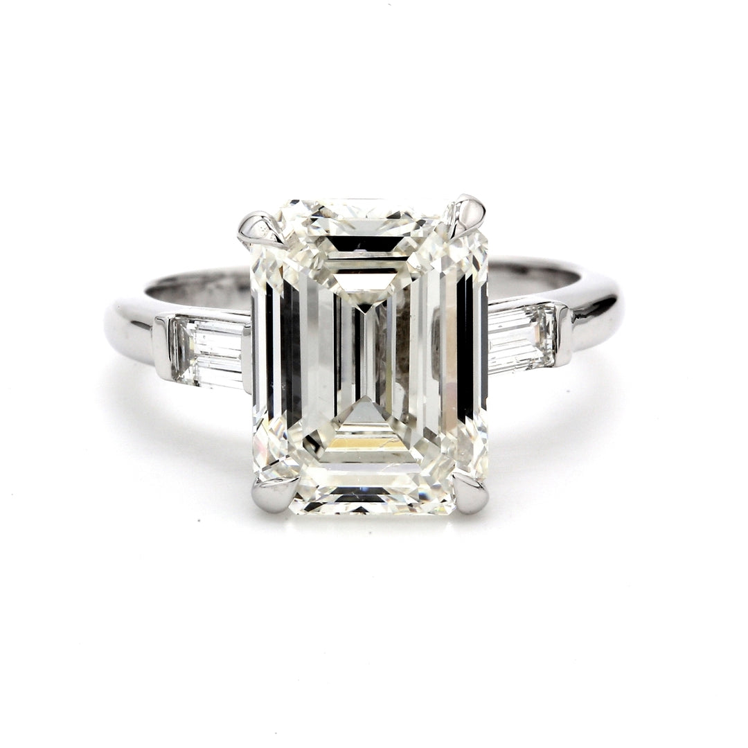 3-stone semi-mount in platinum with channel set baguette diamond sides.  D0.39ct.t.w.