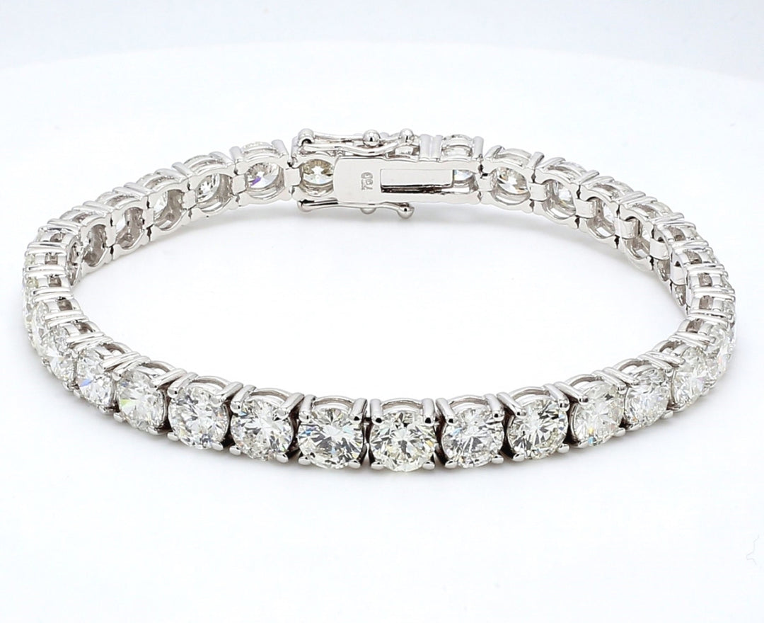 Tennis bracelet in 18K WG with 4-prong set round diamonds.  D17.11ct.t.w.