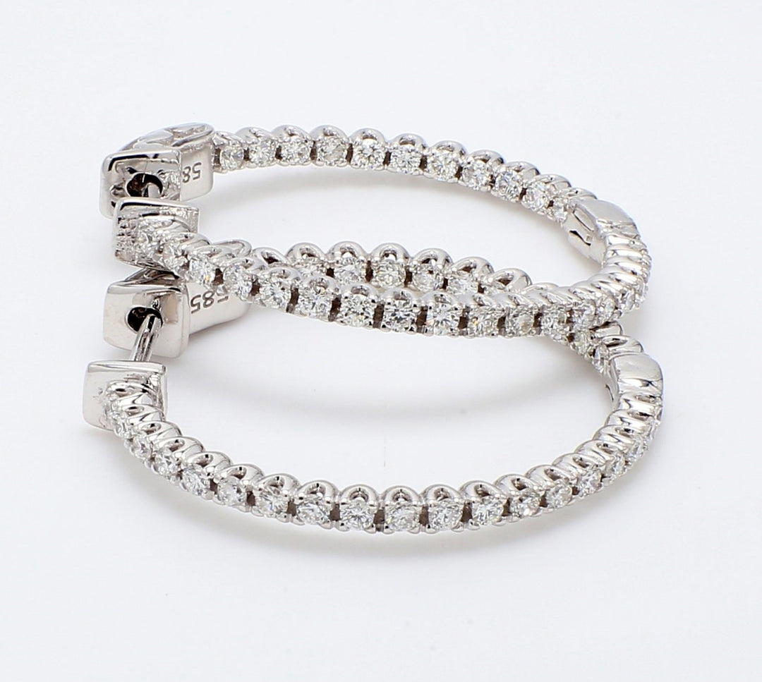 1"" Inside out hoop earrings with U-prong set (60) round diamonds & with special spring lock.  D0.97ct.t.w.