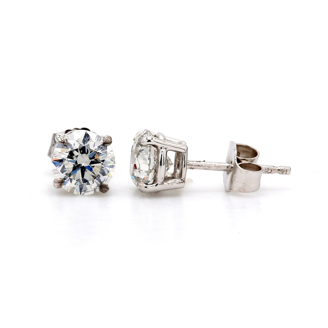 Push back stud earrings with 4-prong set USA certified D-E/SI3-I1 round diamonds.  D1.42ct.t.w.