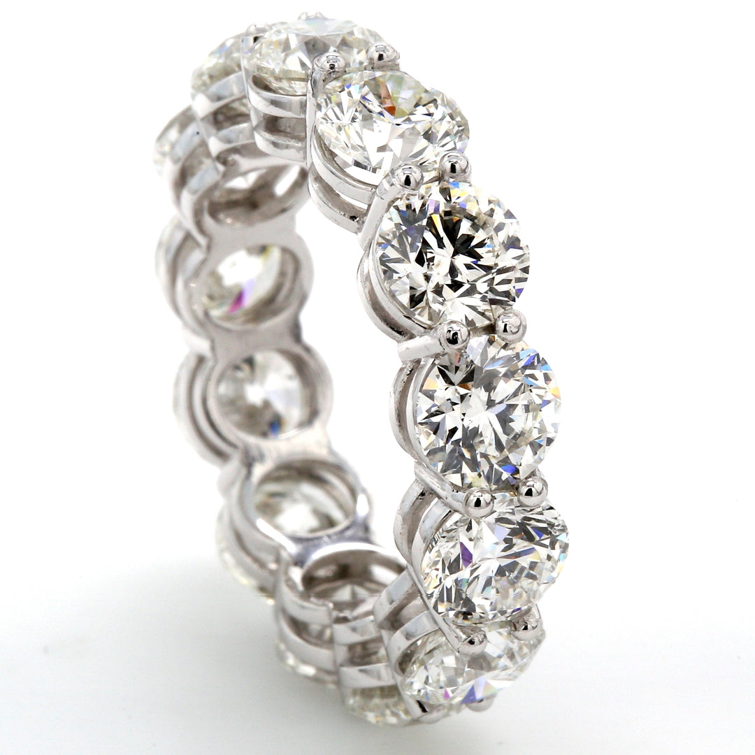 Eternity band in platinum with shared prong set (13) round diamonds.  D9.26ct.t.w.  Size 7.25