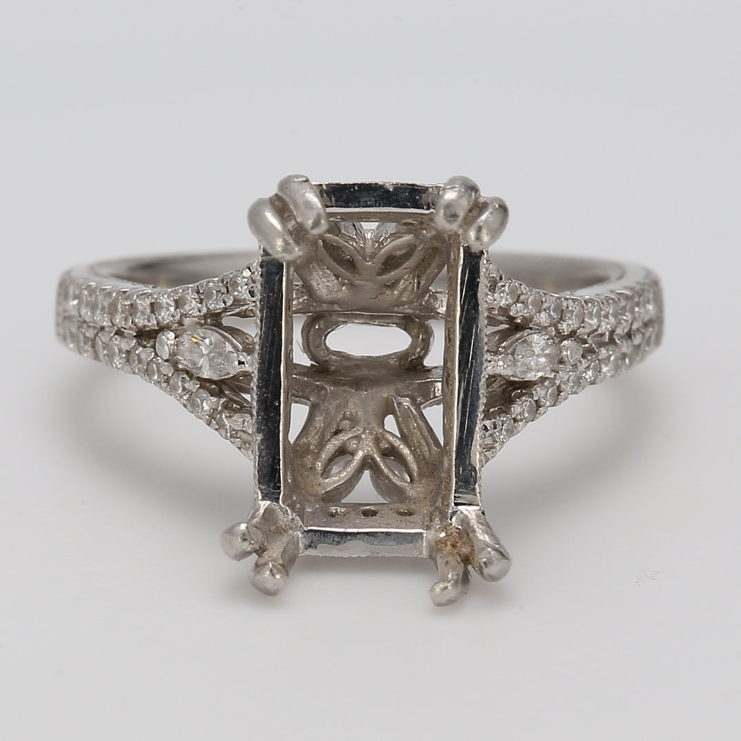 Split-shank semi mount in platinum with U-prong and pave set rounds & prong set marquise diamonds.  D0.64ct.t.w.