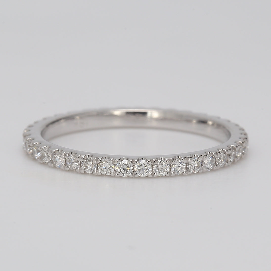 Eternity band in 18K WG with prong set round diamonds.  D0.45ct.t.w.  Size 5.25