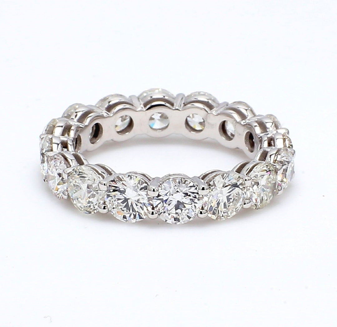 Eternity band with shared prong set round diamonds.  D5.26ct.t.w.