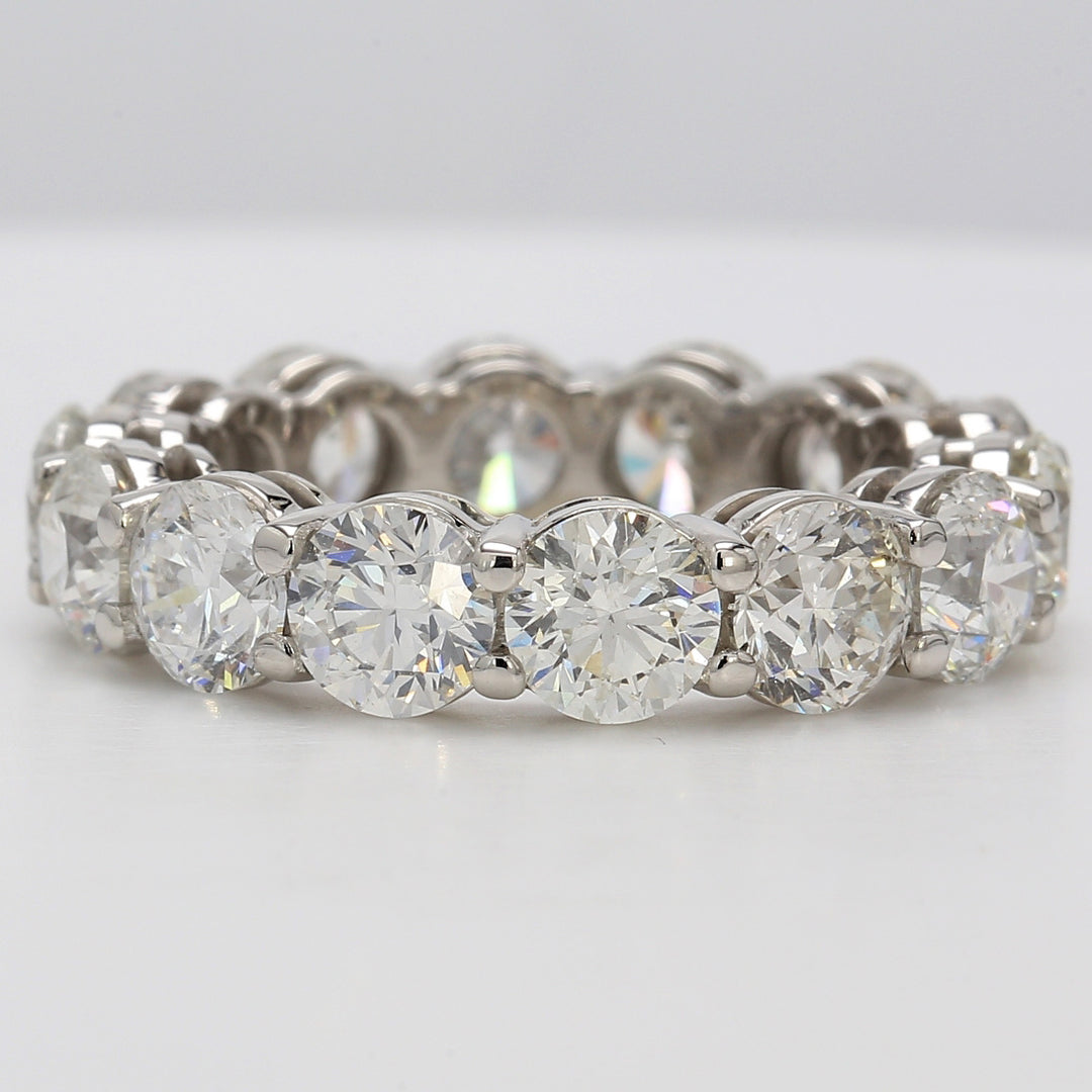 Eternity band in platinum with shared prong set round diamonds.  D8.54ct.t.w.  Size 8