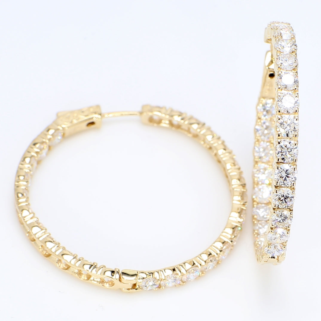 1.25"" Inside out hoop earrings in yellow gold with 4-prong set round diamonds.  D6.98ct.t.w.