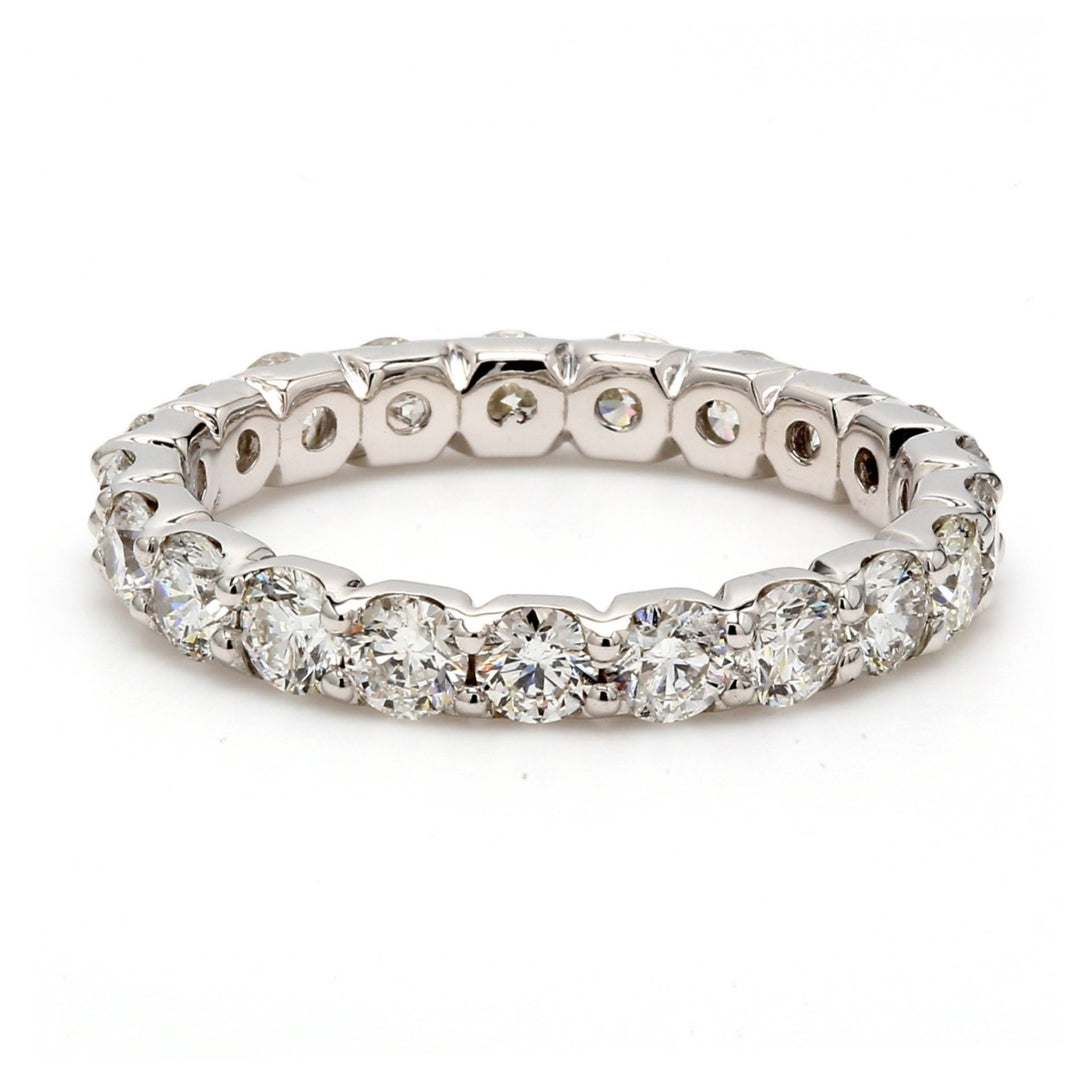 Eternity band with shared prong set (21) round diamonds.  D2.25ct.t.w.