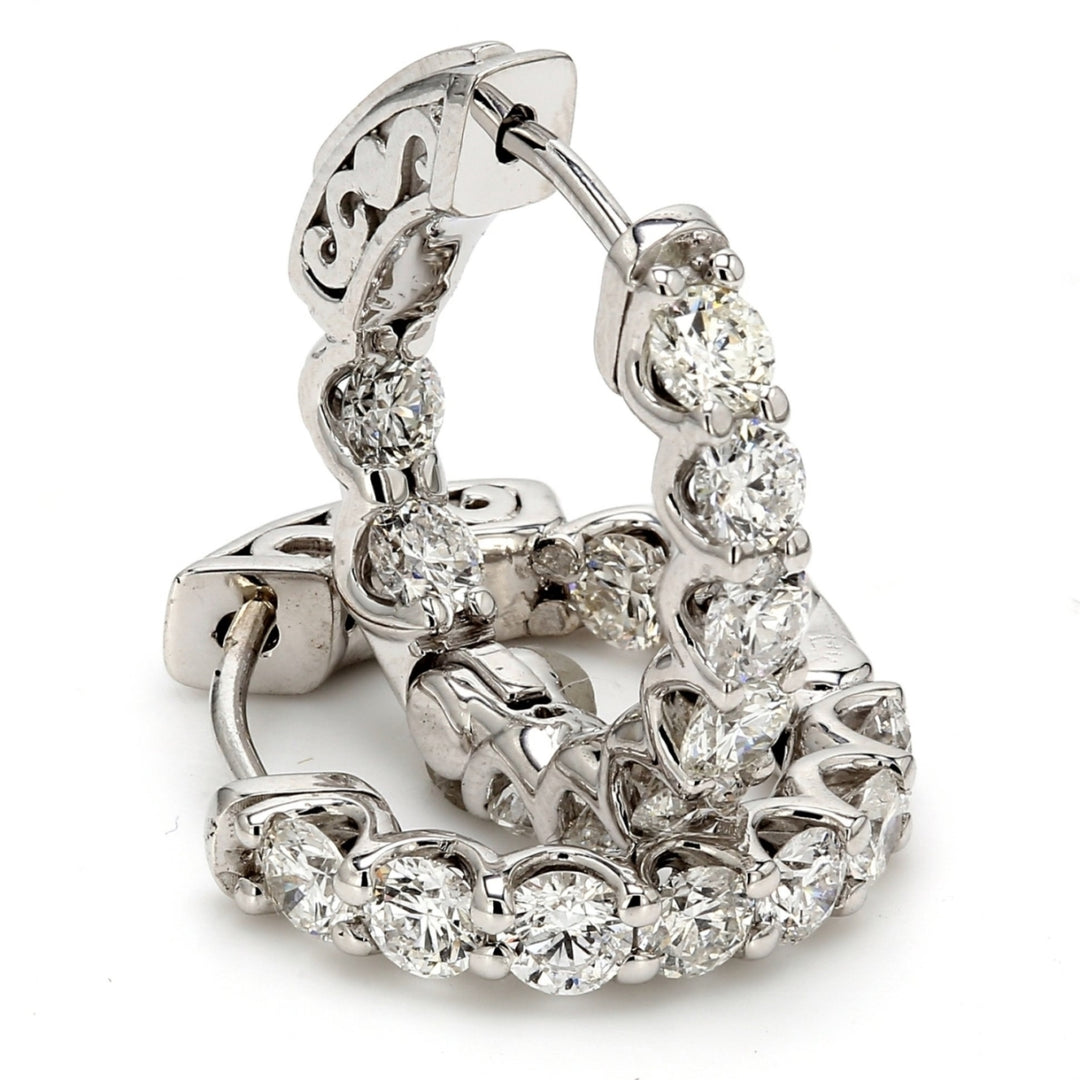 0.50 "" Inside out hoop earrings with U-prong set (18) round diamonds & with special spring lock.  D1.91ct.t.w.