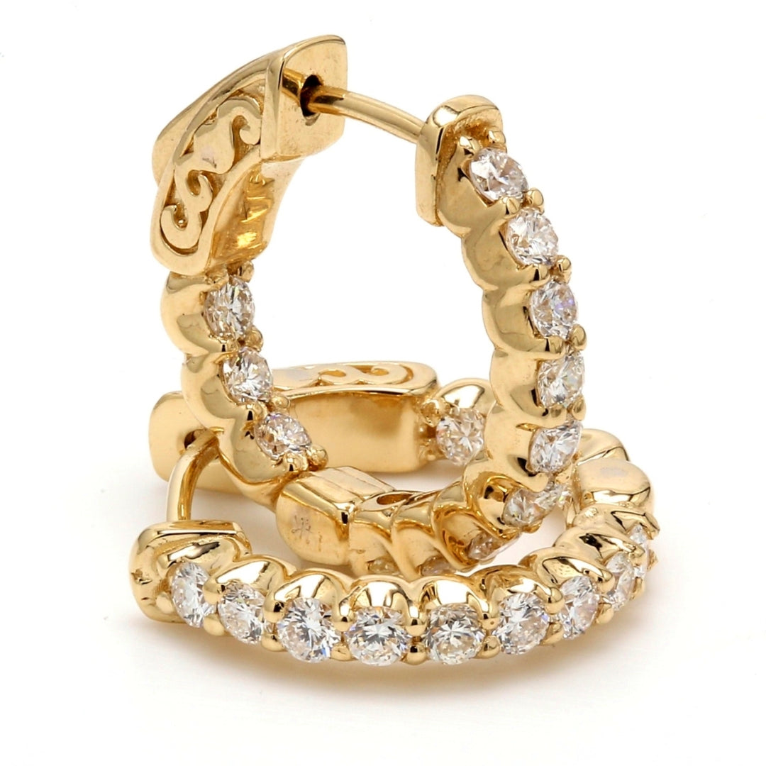 0.50"" Inside out hoop earrings in yellow gold with shared prong set (24) round diamonds & with special spring lock.  D1.24ct.t.w.