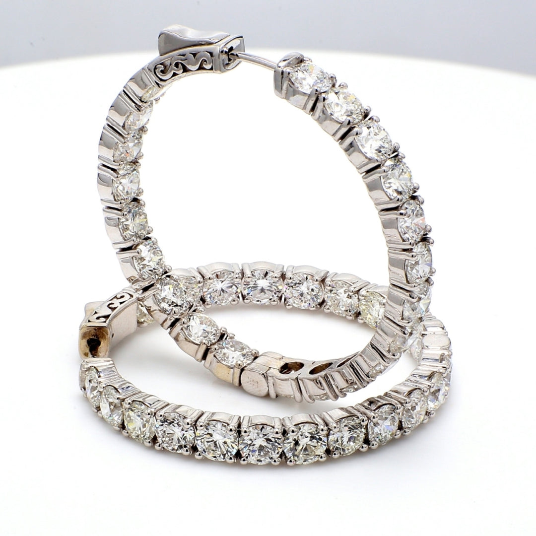 1.5"" Inside out hoop earrings with 4-prong set round diamonds.  D12.99ct.t.w.