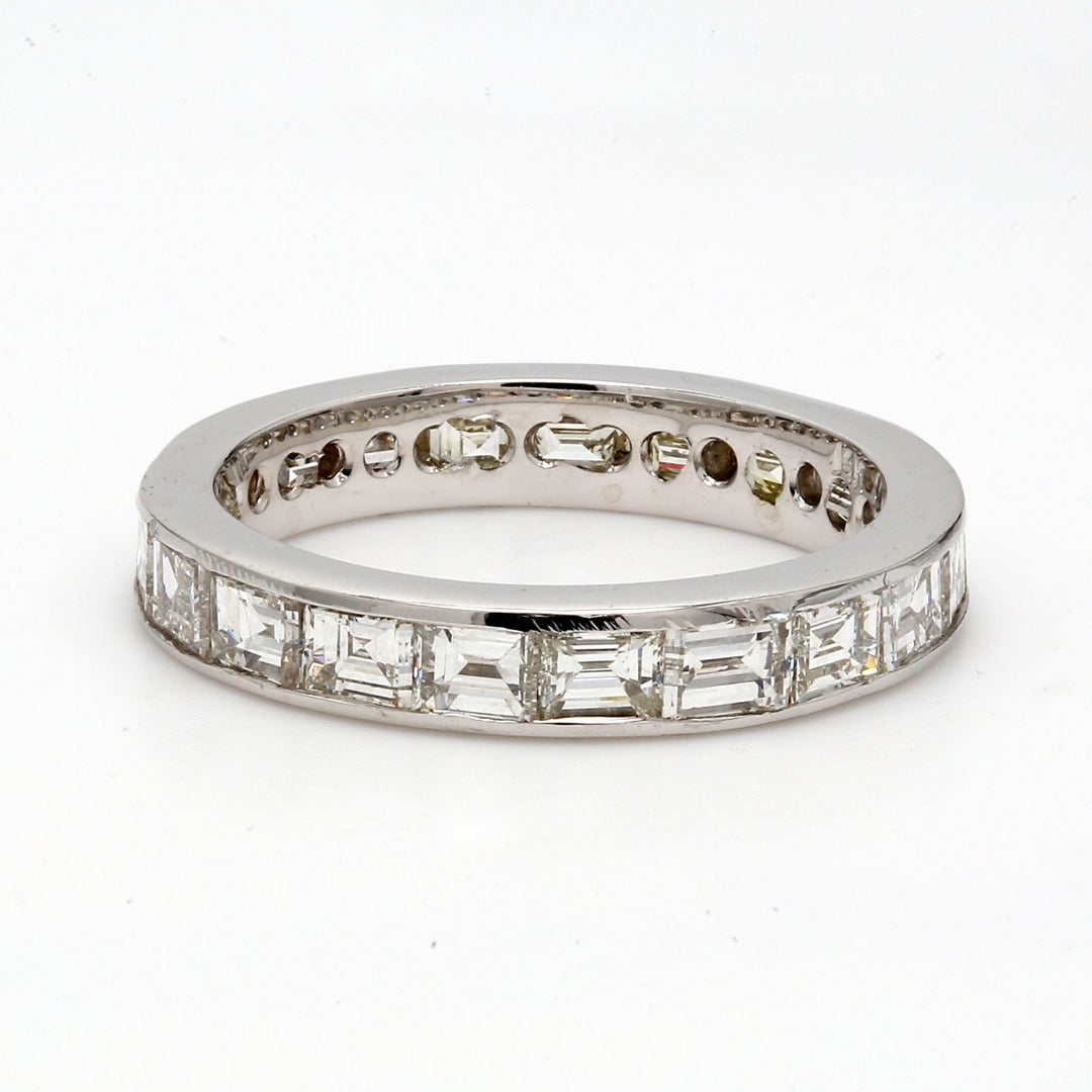 Eternity band with channel set (20) baguette diamonds.  D3.12ct.t.w.  Size 5.75