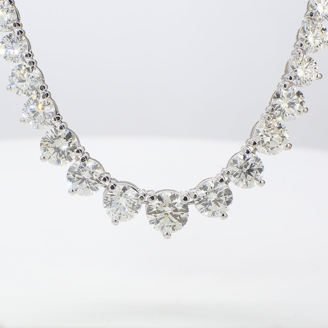 17"" Graduated tennis necklace in 18K WG with 3-prong set round diamonds.  D18.63ct.t.w.