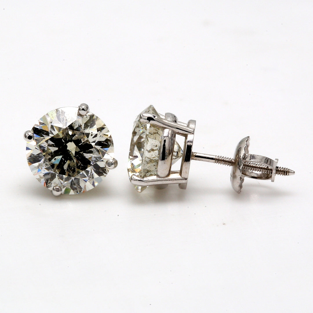 Screw back stud earrings with 4-prong set USA certified H-I/SI3 round diamonds.  D4.08ct.t.w.