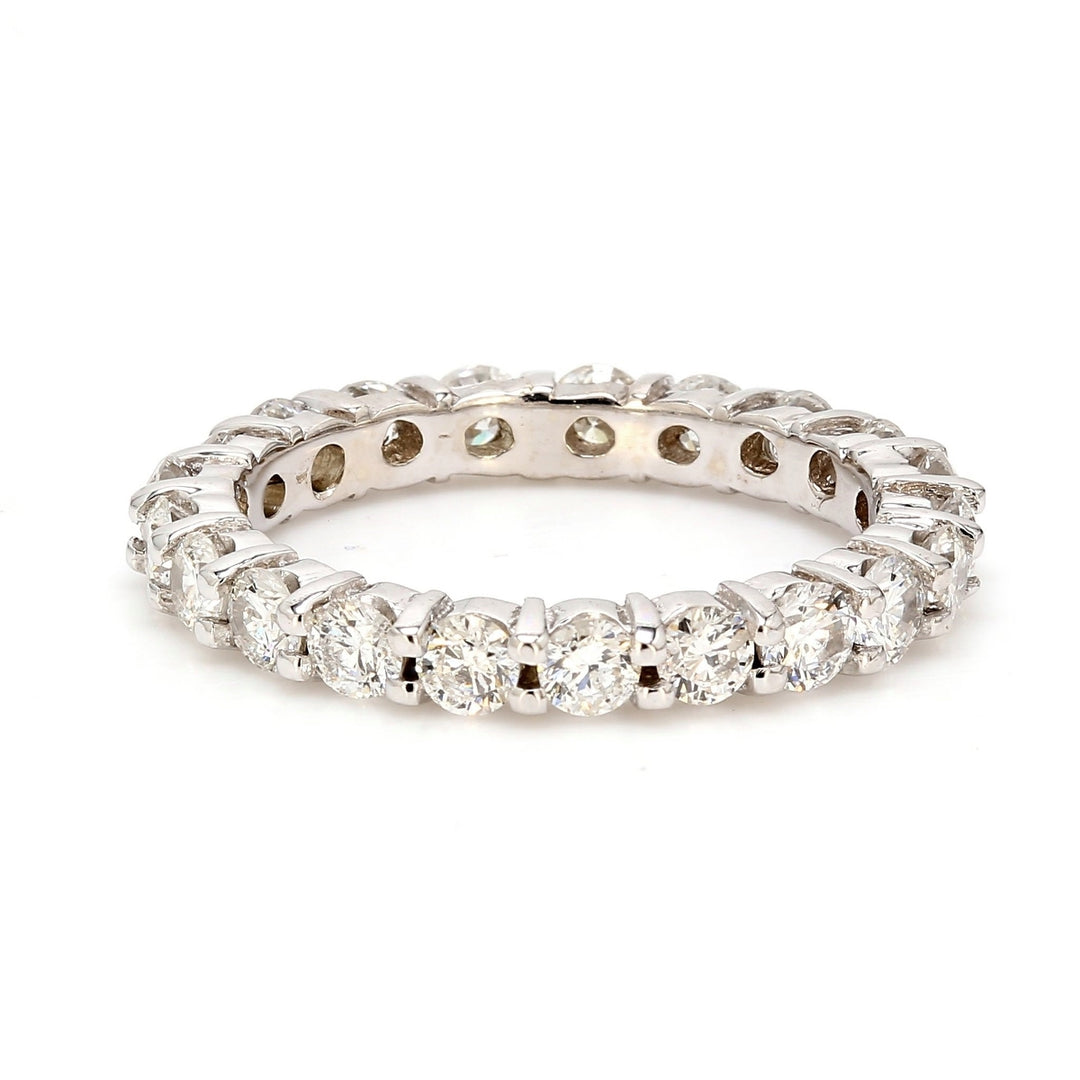 Eternity band with shared prong set round diamonds.  D1.50ct.t.w.