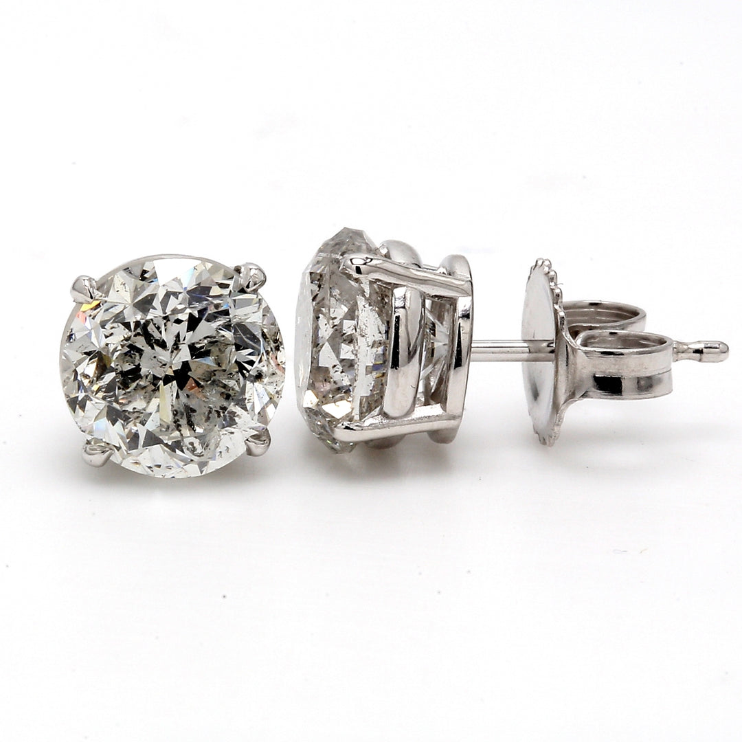 Push back stud earrings with USA certified F-G/I1-I2 round diamonds.  D4.19ct.t.w.