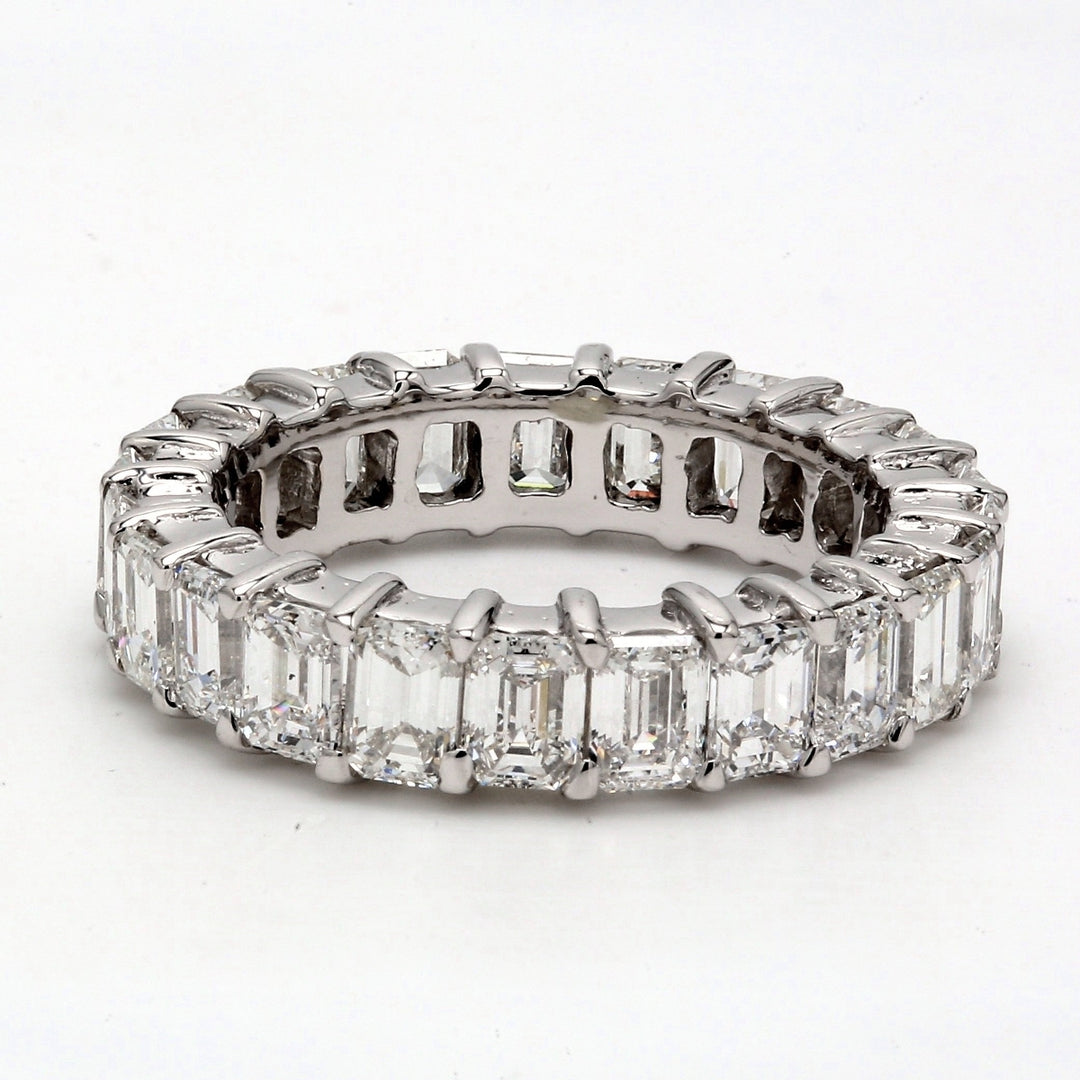 Eternity band with shared prong set E-F/VVS-VS (23) emerald cut diamonds.  D4.46ct.t.w.  Size 6