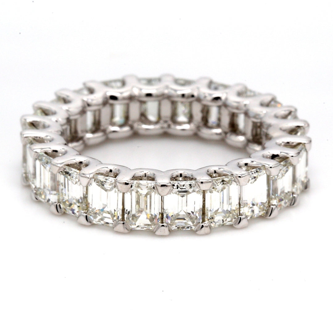 Eternity band in platinum with U-prong set (22) emerald cut diamonds.  D3.50ct.t.w.  Size 5
