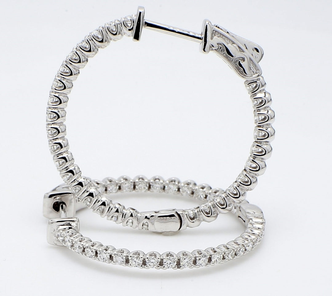 1.25"" Inside out hoop earrings with U-prong set (58) round diamonds & with special spring lock.  D5.03ct.t.w.
