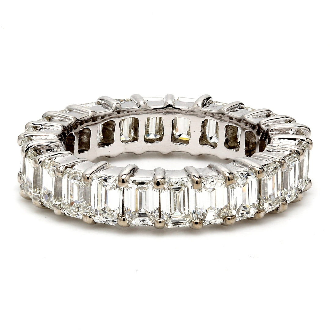Eternity band with shared prong set emerald cut diamonds.  D4.57ct.t.w.