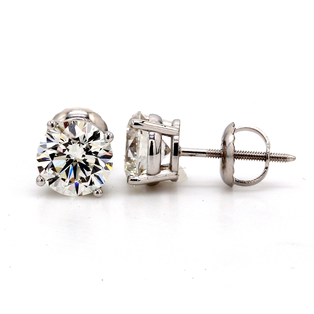 Screw back stud earrings with 4-prong set GIA certified H/I1 round diamonds.  D1.81ct.t.w.