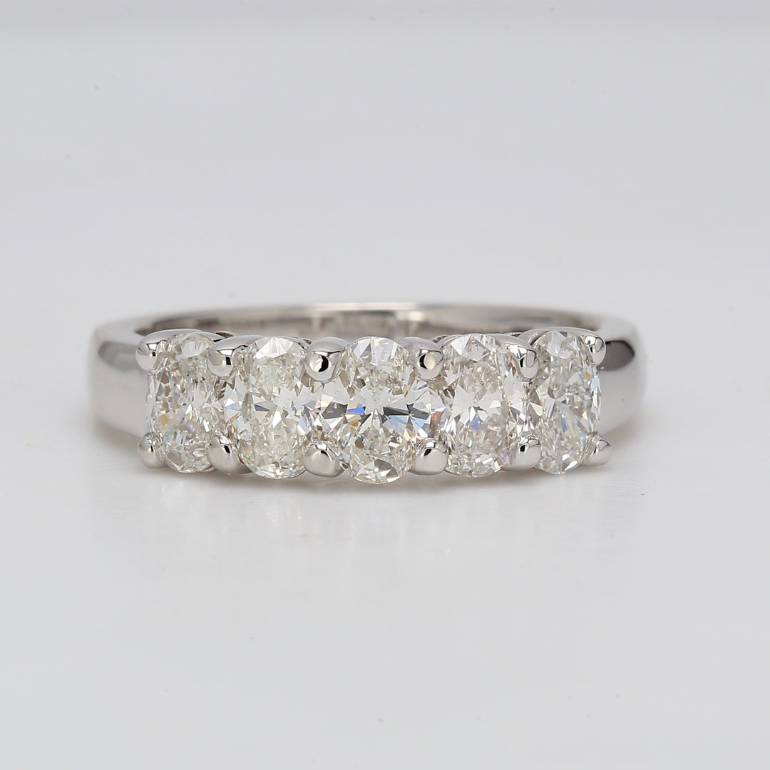 5-stone ring in 18K WG with shared prong basket set oval diamonds.  D1.51ct.t.w.