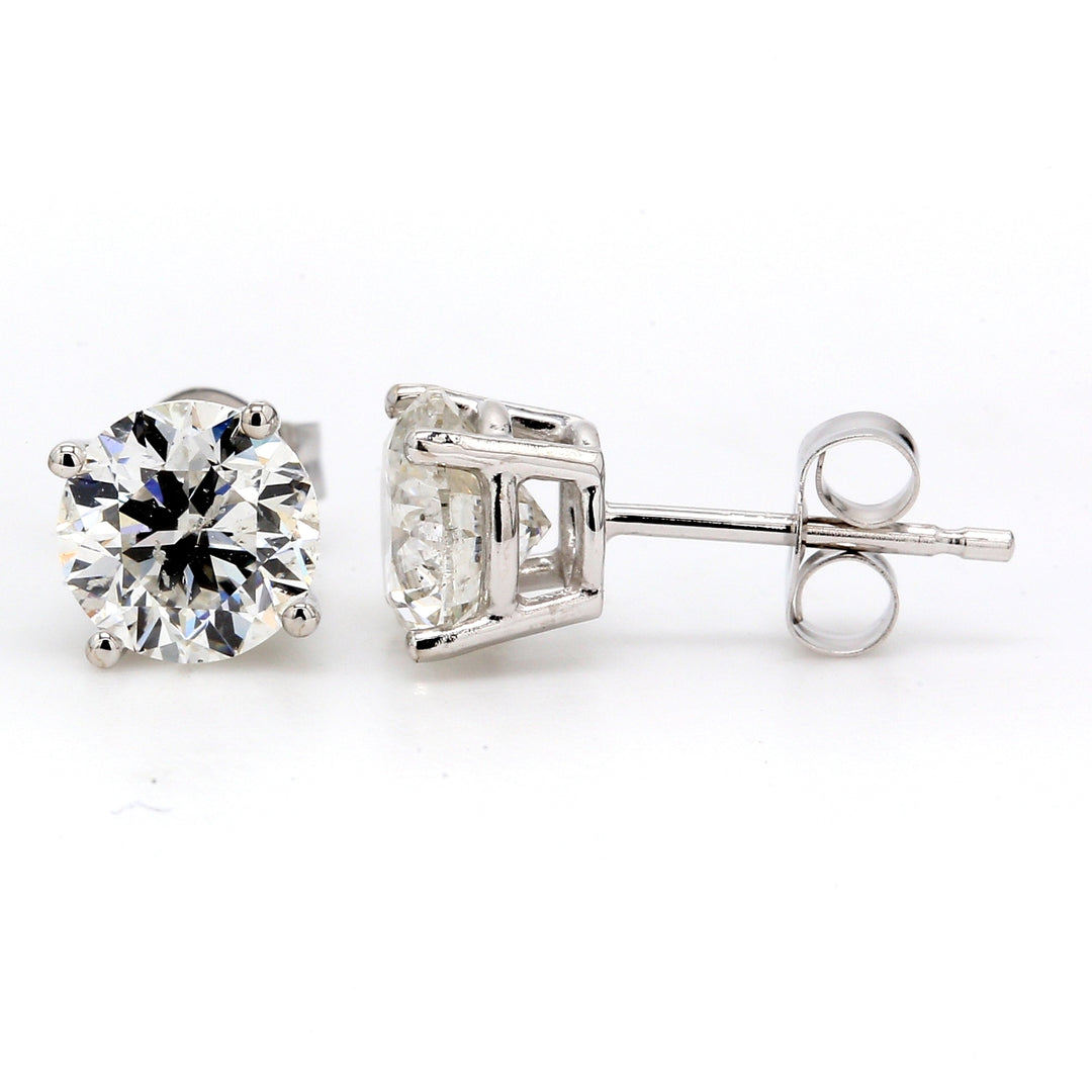 Push back stud earrings with 4-prong set round diamonds.  D1.92ct.t.w.