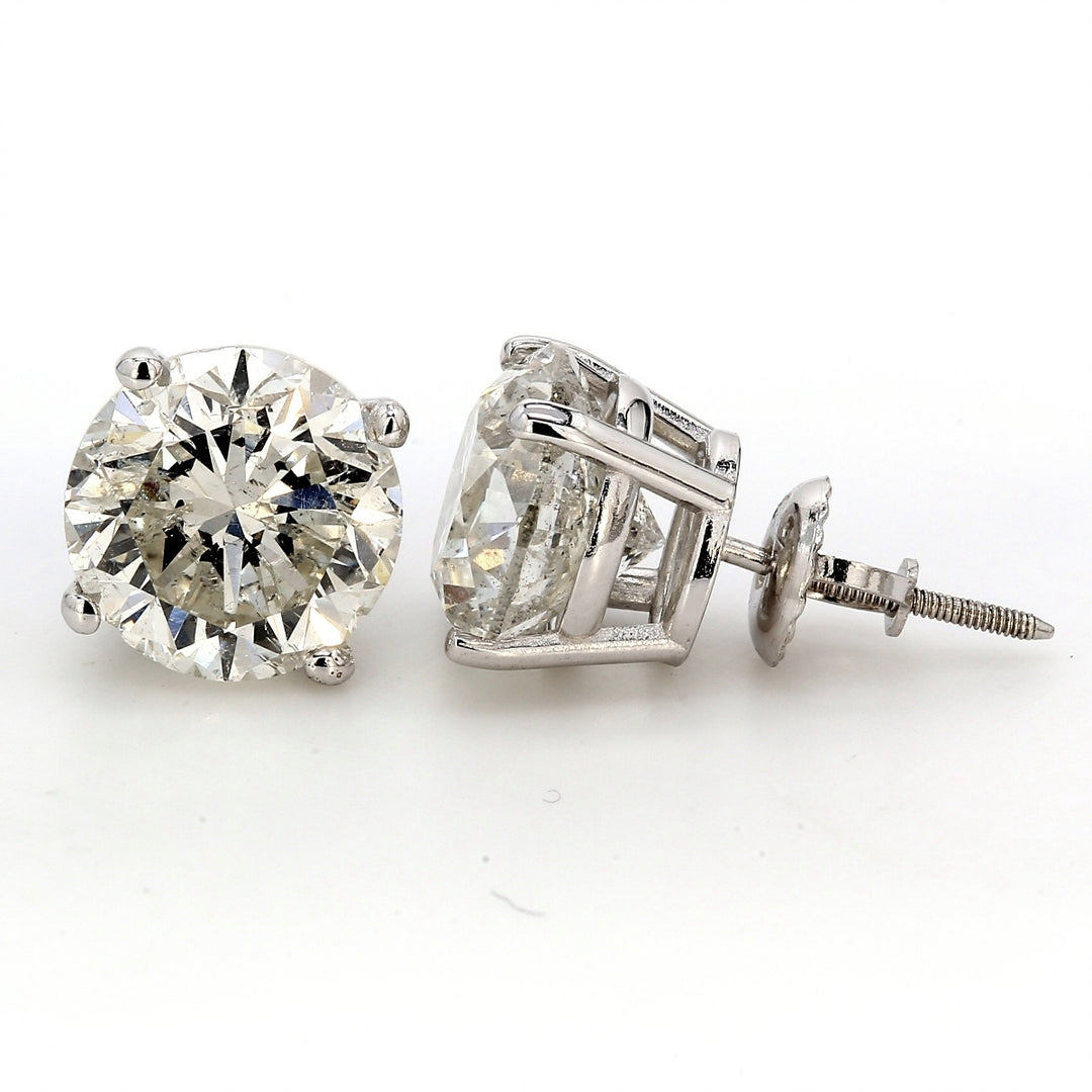 Screw back stud earrings with 4-prong set USA certified E/SI3 round diamonds.  D2.00ct.t.w.