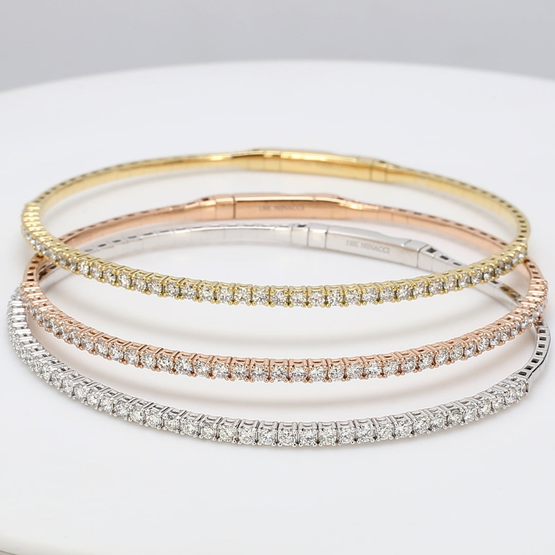 3-piece set light bangle 18K tri-tone with prong set round diamonds.  D3.10ct.t.w.  Size 6.75